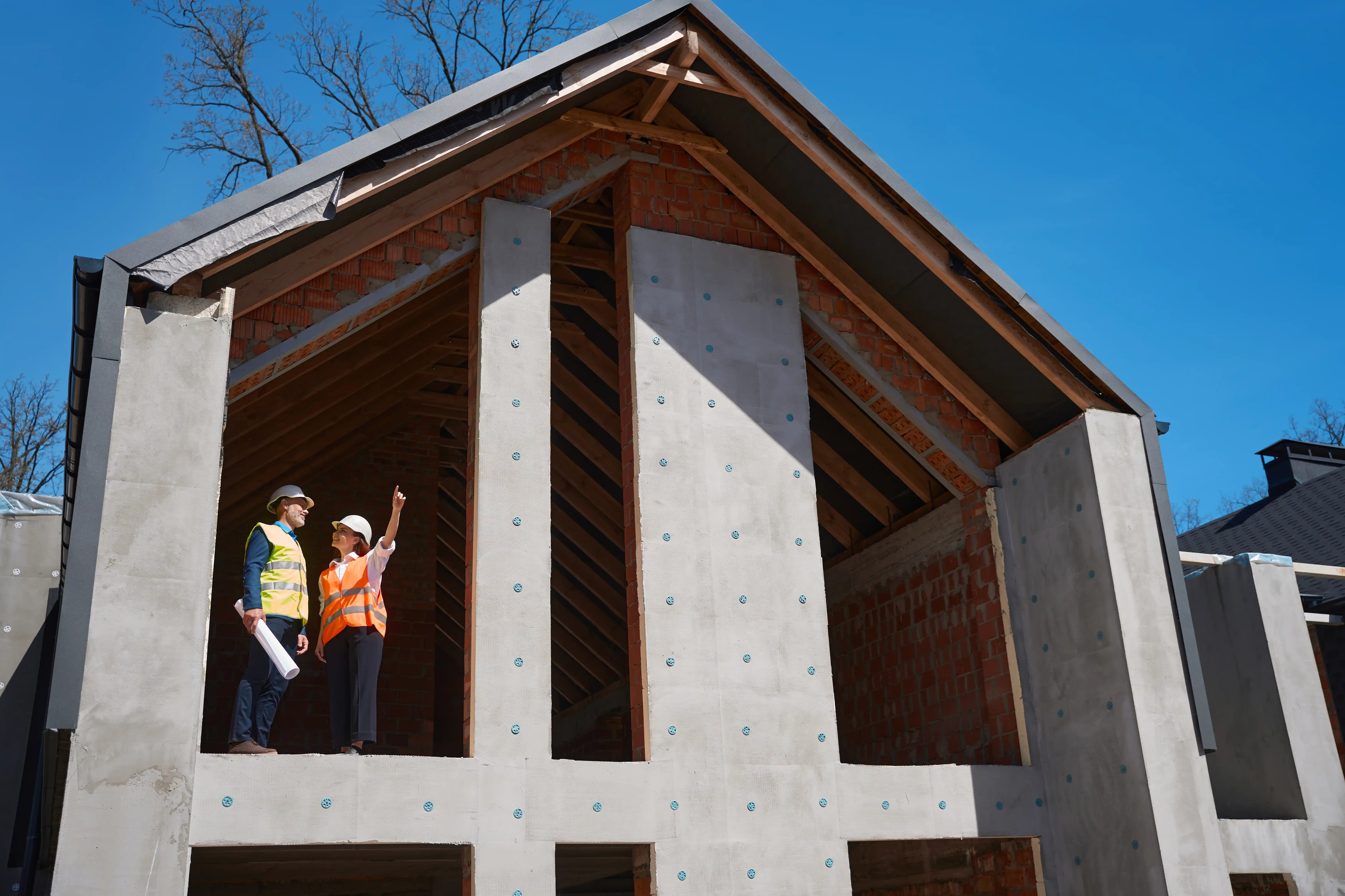 project-manager-and-foreman-standing-on-high-floor