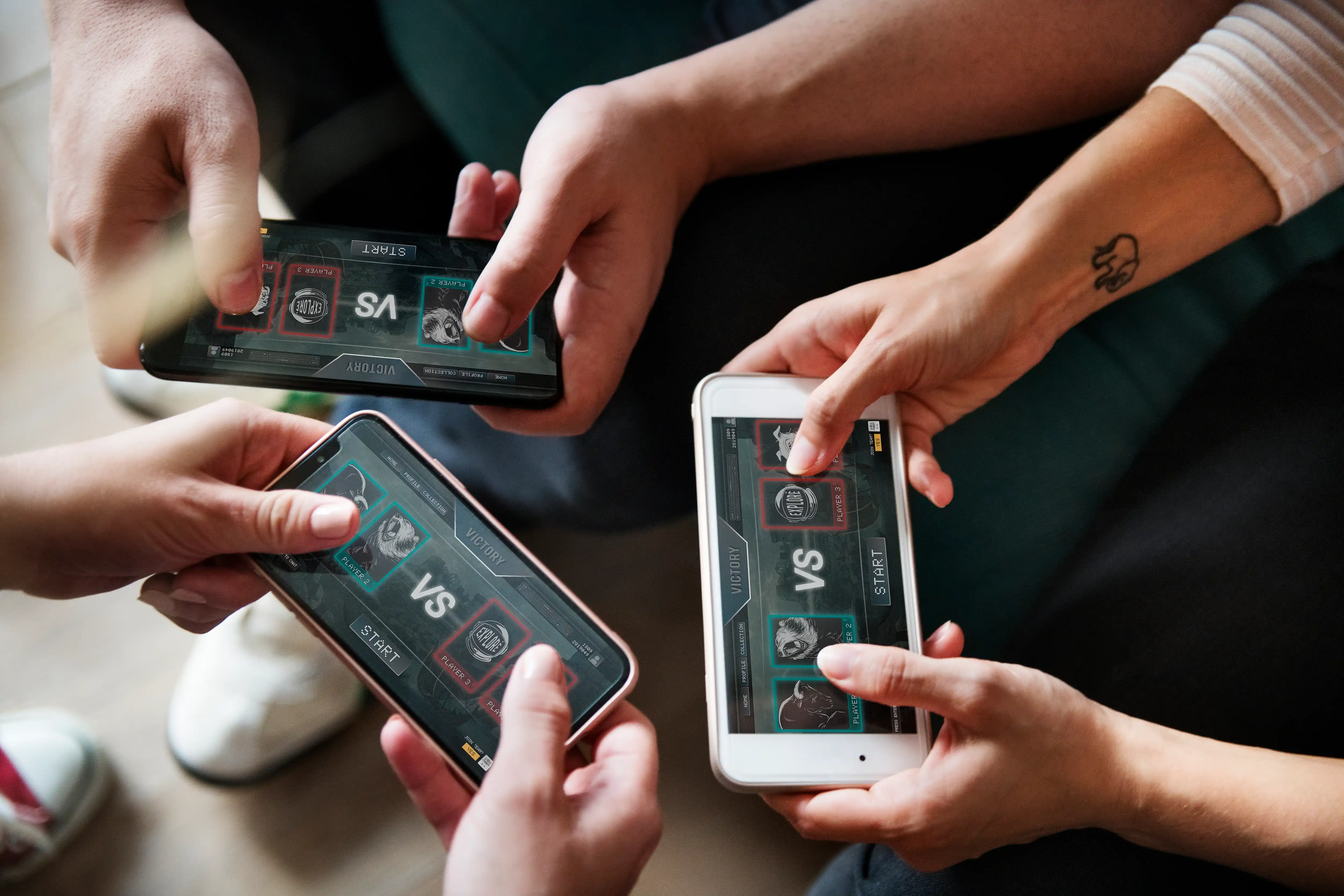 group-of-diverse-friends-playing-game-on-mobile-phone